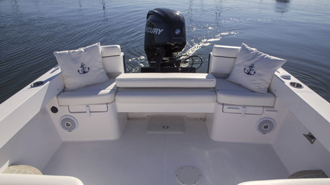 23-foot boat rear seating with nautical pillows 
