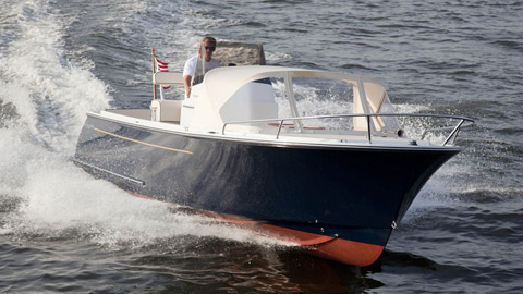 24-center-console boat with red bottom 